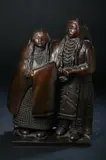 Doug Hyde, Two Native American Figures, Bronze with dark golden brown patina - Height: 17 in