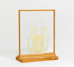"D + D" by Felix Droese, 1993, Bienenwachs  und Holzscheibe zwischen zwei Plexiglasscheiben in Holzständer gesteckt, sold Dec 2020