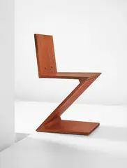 'Zig-Zag' chair by Gerrit Rietveld, 1945-1960, Stained elm, brass, offered Apr 2015