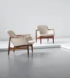 Pair of armchairs, model no. NV53 by Finn Juhl, circa 1953, Teak, fabric, brass, sold Apr 2015