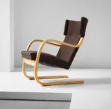 Early cantilevered highbacked armchair, model no. 36/86, from the Harry and Maire Gullichsen residence, Kaivopuisto, Helsinki by Alvar Aalto, 1935, Bent birch laminated plywood, fabric, sold Apr 2015