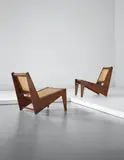 Pair of low chairs, model no. PJ-SI-59-A, designed for private residences, Chandigarh by Pierre Jeanneret, circa 1955, Teak, cane, sold Apr 2015