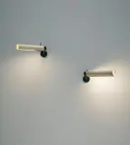 Pair of adjustable wall lights, model no. 210 by Gino Sarfatti, circa 1955, Painted aluminium, painted brass, sold Apr 2015