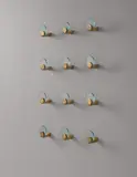 Set of twelve wall-mounted coat hangers by Fontana Arte, circa 1960, Glass, brass, sold Apr 2015