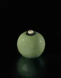 Henri Simmen and Eugenie O'Kin, Lidded pot with carved stopper, circa 1925, Stoneware with green crackle glaze, carved ebony and ivory stopper
