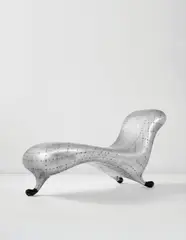 Marc Newson, Lockheed Lounge, circa 1990, Fibreglass-reinforced polyester resin core, blind-riveted sheet aluminium, rubber-coated polyester resin
