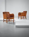 Pair of 'Mix' easy chairs, model no. 4396 by Kaare Klint and Edvard Kindt-Larsen, designed 1930, executed 1935, Cuban mahogany, Niger leather, brass studs, sold Apr 2015