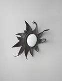 'Folie' mirror, or 'Le Soleil a Rendez-vous avec la Lune' by Line Vautrin, circa 1958, Talosel resin, mirrored glass, sold Oct 2015