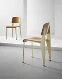 Pair of 'Semi-metal' chairs, model no. 305 by Jean Prouvé, circa 1950, Painted steel, painted tubular steel, oak-veneered plywood, sold Oct 2015