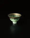 Green bowl with golden lip by Lucie Rie, circa 1978, Porcelain, green glaze with running golden lip and manganese speckle, sold Oct 2015