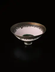 Footed bowl by Lucie Rie, circa 1980, Porcelain, inlaid pink lines, turquoise and golden manganese bands, sold Oct 2015