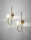 Pair of wall lights, model no. 245 by Gino Sarfatti, circa 1964, Nickel-plated tubular metal, nickel-plated metal, painted metal, glass, sold Oct 2015