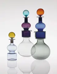 Kaj Franck, Pair of 'Kremlin Kellots' (Kremlin Bells) double decanters and decanter, model no. KF 1500, designed 1957, executed 1962-1964, Decanters: mould blown coloured glass, flared; stoppers: free-blown glass