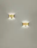 Pair of wall lights, model no. 9460 by Paavo Tynell, 1950s, Perforated brass, brass, sold Oct 2015