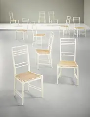 Erik Chambert, Set of ten 'Poem' chairs, designed 1953, executed 1950s, Painted wood, cane