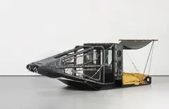 Ashley Bickerton, The Big Screwed Up, 1989, steel, leather, rubber, hessian, reinforced glass, magazines, books, plastic, plastic coated wire, pulleys, carribenas, chord, fans