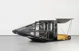 Ashley Bickerton, The Big Screwed Up, 1989, steel, leather, rubber, hessian, reinforced glass, magazines, books, plastic, plastic coated wire, pulleys, carribenas, chord, fans