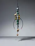 Ashley Bickerton, Cousteau Totem (Jacques and his Pudenda), 1993, wood, nylon, webbing, rope, rubber pouches, rubber tubing, coloured water, coconuts, gaffa tape