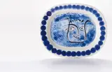 Visage noir putoisé (Face in Black and Sable) by Pablo Picasso, 1948, White earthenware rectangular dish painted in colours with brushed glaze,, sold Jun 2014