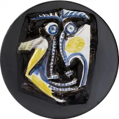 Visage (Face) by Pablo Picasso, 1960, White earthenware round dish painted in colours with partial brushed glaze,, sold Jun 2014