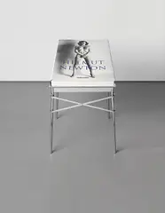 SUMO by Helmut Newton, Monte Carlo: Taschen, 1999. Oversized photography book with original metal stand designed by Philippe Starck, sold May 2014