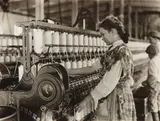 Lewis Hine, Spinner in Vivian Cotton Mills, Cherryville, N.C. Been at it 2 years. Where will her good looks be in ten years? Location: Cherryville, North Carolina, November