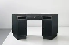 Desk by Jacques Adnet, circa 1935, Leather-bound wood, ebonised wood, brass, sold Apr 2014