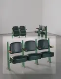 Jean Prouvé, Row of three lecture theatre chairs with adjustable seats, designed for the Faculté de Lettres, Université de Besançon, 1952-1956, Painted bent steel, painted tubular steel, oak, vinyl
