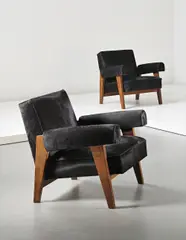 Pair of armchairs, model no. LC/PJ-SI-42-A/B, designed for the High Court and Assembly, Chandigarh by Le Corbusier and Pierre Jeanneret, circa 1955-1956, Teak, hide, sold Apr 2014