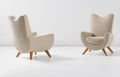 Jean Royere, Pair of ‘Ambassador’ armchairs, circa 1955, Fabric, oak