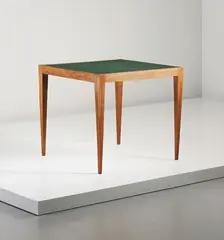 Game table by Jean Royere, circa 1950, Oak, leather, offered Apr 2014
