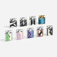 Ronson, Collection of nine cigarette lighters, c. 1928, enamel on metal