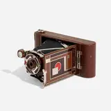 Walter Dorwin Teague, Kodak camera, model 1A, c. 1930, gilt, chrome-plated and enameled metal, wood, camera, leather