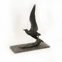 A Cavina, Untitled, A Cavina (20th century) A wheeling seagull bronze on a black marble base