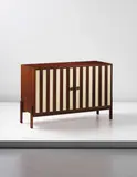 Sideboard by Ettore Sottsass, circa 1959, Indian rosewood-veneered wood, Indian rosewood, painted wood, brass, sold Apr 2014