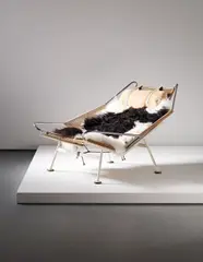 Hans J. Wegner, Early 'Flag Halyard' armchair, model no. GE225, circa 1950, Chromium-plated tubular metal, painted tubular metal, halyard, wool, fabric
