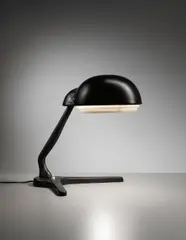 Table lamp, model no. A704 by Alvar Aalto, circa 1954, Perforated painted metal, leather-bound metal, sold Apr 2014