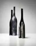 Paolo De Poli, Two bottles, 1950s, Enamelled hammered copper