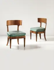 Walter Gropius, Pair of chairs, designed for Dr. Keysselitz, Marburg, circa 1913, Leather, mahogany