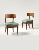Walter Gropius, Pair of chairs, designed for Dr. Keysselitz, Marburg, circa 1913, Leather, mahogany