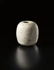 Spherical vase by Lucie Rie, circa 1972, Stoneware, white glaze, manganese speckle, sold Sep 2014