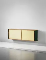 Rare wall-mounted sideboard by Jean Prouvé, circa 1941-1942, Oak, painted bent sheet steel, painted aluminium, painted metal, sold Sep 2014