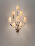 Jean Royere, ‘Persane’ eight-armed wall light, circa 1953, Painted and gilded metal, paper shades