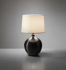 Table lamp by Jean Besnard, circa 1930, Glazed ceramic, fabric shade, offered Sep 2014