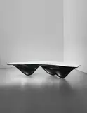 Zaha Hadid, Black 'Aqua' table, 2006, Polyurethane resin, silicone