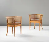 Kaare Klint and Carl Petersen, Pair of 'Faaborg' armchairs, model no. 4395, designed for the Faaborg Museum, Copehagen, designed 1914, executed 1954, Bossé mahogany, Niger leather, cane