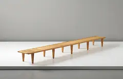 Unique and long bench, model no. 574, commissioned by Anker Petersen, Copenhagen by Hans J. Wegner, circa 1958, Oak, offered Sep 2014