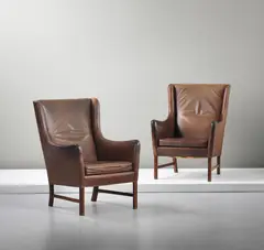 Pair of highback armchairs by Ole Wanscher, circa 1962, Brazilian rosewood, leather, offered Sep 2014