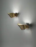 Paavo Tynell, Pair of wall lights, model no. 9466, 1950s, Perforated brass, brass, frosted glass