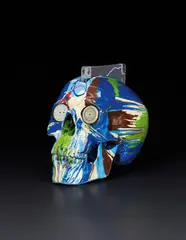 The Hours Spin Skull by Damien Hirst, 2009, household gloss paint on plastic skull with metal watch faces and CD, offered Apr 2013